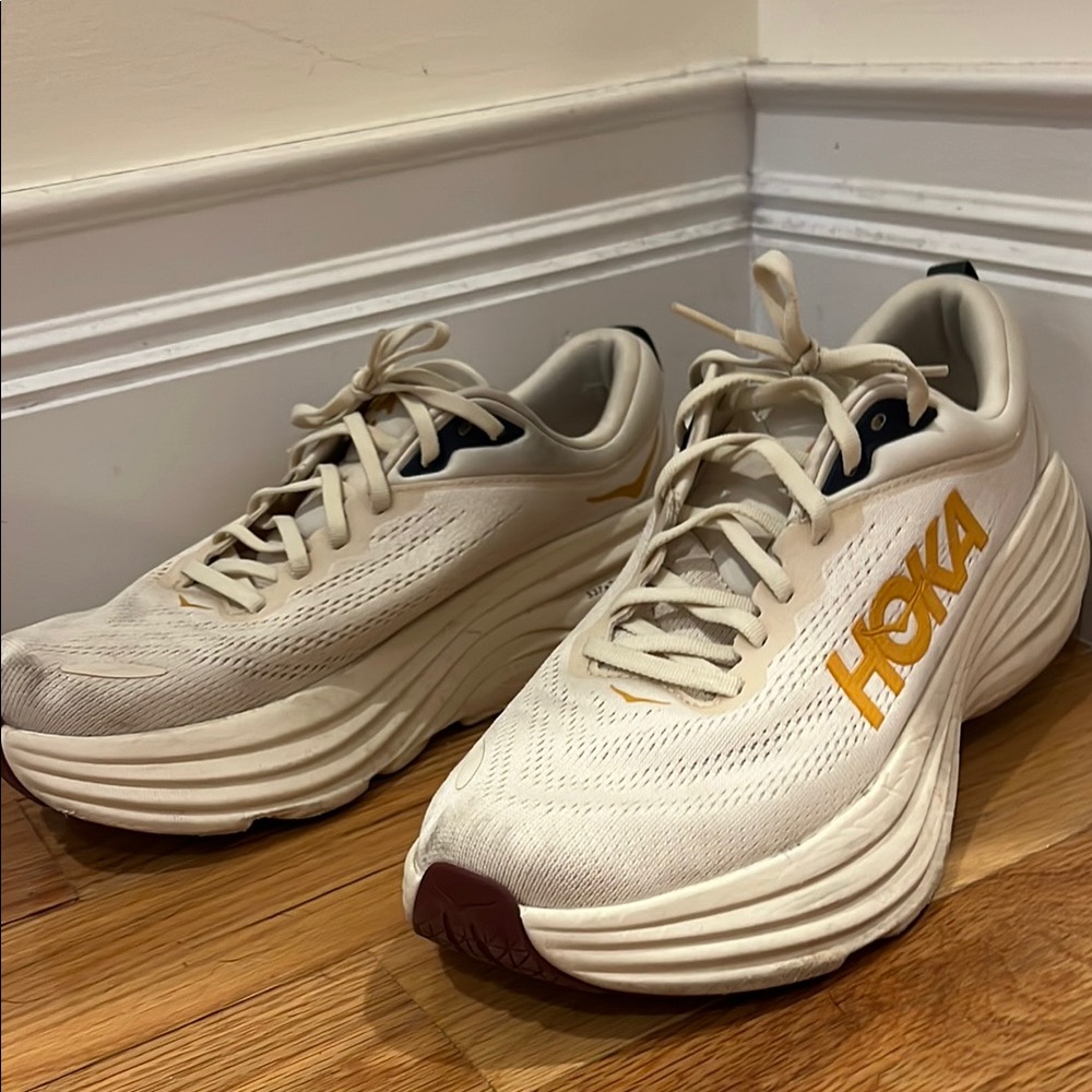 Hoka bondi 8 Athletic Shoes in Cream and Gold